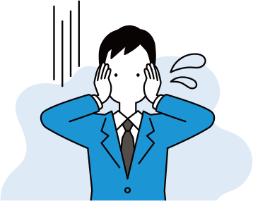 頭を抱える男性